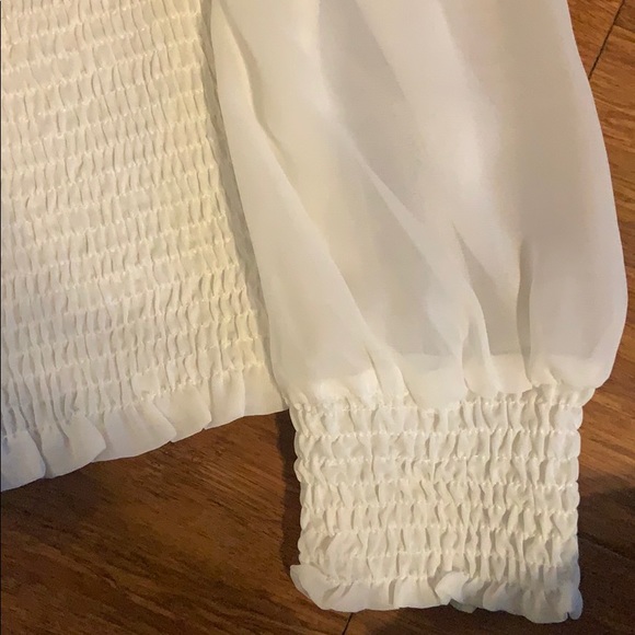 Trendy white smocked top with puffy sheer sleeves - Picture 5 of 5